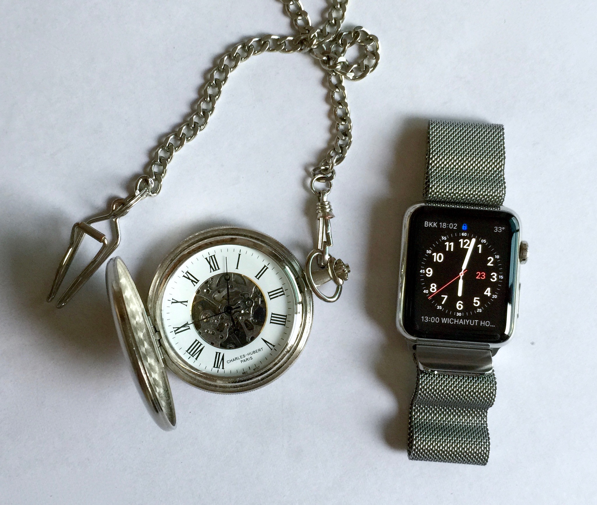 Apple Watch and pocket watch