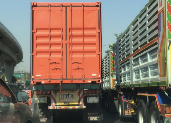 container on flatbed trailer