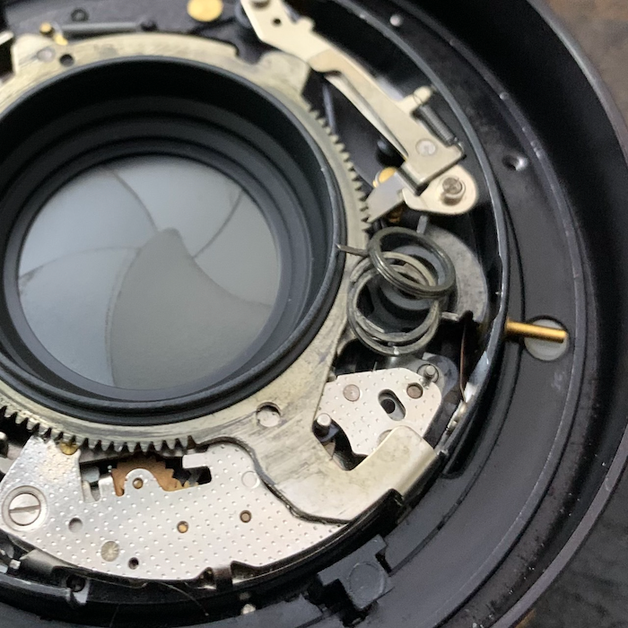 lens with broken
spring